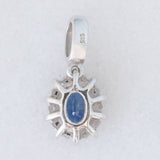 Ciondolo a margherita in oro bianco 14K con zaffiro (0.60ct ca.) e diamanti (0.20ctw ca.), anni ‘80