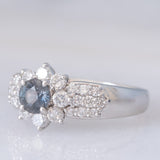 Vintage platinum daisy ring with color-change garnet (approx. 0.35ct) and diamonds (0.58ctw)