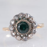 Anillo antiguo de oro amarillo de 14 quilates y plata con margaritas, topacio azul (aprox. 0.40 ct) y diamantes talla rosa (aprox. 0.22 ct), principios del siglo XX.