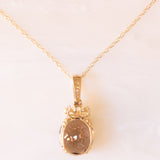 Collana vintage con catenina in oro giallo 9K e ciondolo in oro giallo 9K con quarzo fumé (6.50ct ca.), quarzi citrini (0.50ctw ca.) e diamanti (0.05ctw ca.)