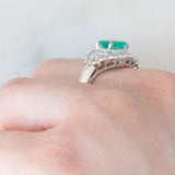 Anello a margherita vintage in platino con smeraldo colombiano (1.07ct) e diamanti (1.01ctw), anni ‘80