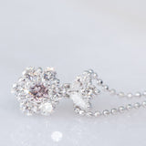 Cogli questa rosa - Collana vintage in platino con diamante rosa e diamanti bianchi