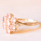 Vintage 10K yellow gold flower ring with synthetic pink sapphires (approx. 1.20ctw) and white sapphires, 1992