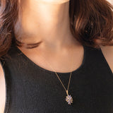 Vintage-Halskette mit Kette aus 9-karätigem Gelbgold und Anhänger aus 9-karätigem Gelbgold mit Tansaniten (ca. 0.48 ctw) und Diamanten, 80er/90er Jahre