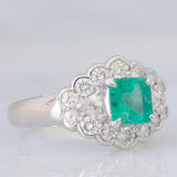 Anello a margherita vintage in platino con smeraldo colombiano (1.07ct) e diamanti (1.01ctw), anni ‘80