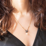 Necklace with 18K yellow gold chain and antique decoration in silver and 18K yellow gold with rose cut diamonds and white pearl