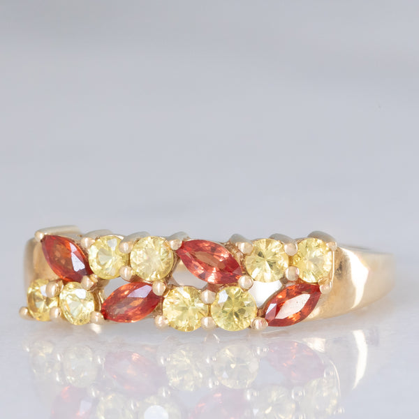 Anello vintage in oro giallo 9K con zaffiri sintetici arancioni e gialli (0.80ctw ca.), anni ‘90