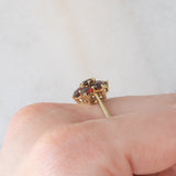 Anello a fiore vintage in oro giallo 8K con granati (1.10ctw ca.), anni ‘70