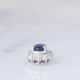 Ciondolo a margherita vintage in platino con zaffiro (0.64ct) e diamanti (0.23ctw)