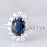 Anello a margherita vintage in platino con zaffiro (1.40ct) e diamanti di taglio brillante (0.94ctw), anni ‘80/‘90