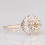 Anello a margherita vintage in oro bianco 14K con diamanti di taglio brillante (0.16ctw ca.) e con centrale fancy brown, anni ‘80