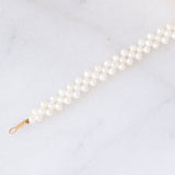 Collana vintage di perle bianche con chiusura in oro giallo 18K, anni ‘60/‘70
