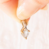 Vintage-Halskette mit Kette aus 9-karätigem Gelbgold und Anhänger aus 9-karätigem Gelb- und Weißgold mit blauem Topas im Herzschliff (ca. 0.60 ct), ca. 90er Jahre.