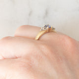 Vintage 9K yellow gold band ring with tanzanite (0.40ct approx.) and diamonds (0.12ctw approx.), year 2004