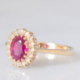 Anello a margherita vintage in oro giallo 14K con rubino (1.50ct ca.) e diamanti (0.16ctw ca.), anni ‘70/‘80