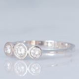 Vintage-Trilogie aus 14 Karat Weißgold mit Diamanten im Brillantschliff (ca. 0.26 Karat), 90er Jahre