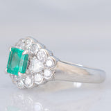 Anello a margherita vintage in platino con smeraldo colombiano (1.07ct) e diamanti (1.01ctw), anni ‘80