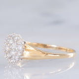 Anello a fiore vintage in oro giallo e bianco 14K con diamanti di taglio brillante (0.55ctw ca.), anni ‘80