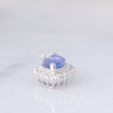 Ciondolo a margherita vintage in platino con tanzanite (0.81ct) e diamanti (0.37ctw)