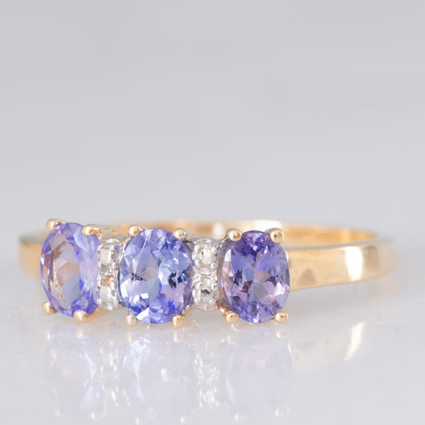 Trilogy vintage in oro giallo 14K con tanzaniti (0.75ctw ca.), anni ‘80