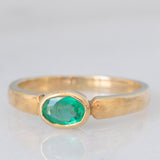 Solitario in oro giallo 9K con smeraldo (0.33ct)