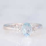 Trilogy vintage in oro bianco 18K con acquamarina (0.60ct ca.) e diamanti, anni ‘80