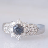 Vintage platinum daisy ring with color-change garnet (approx. 0.35ct) and diamonds (0.58ctw)