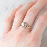 Anello a margherita antico in oro giallo 14K e argento con perla bianca e diamanti di taglio rosetta (0.13ctw ca.), primi del ‘900