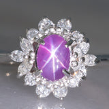 Anello a margherita vintage in platino con rubino (1.61ct) e diamanti (0.60ctw), anni ‘80/‘90