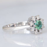 Anello a margherita vintage in oro bianco 14K con tormalina verde (0.35ct ca.) e diamanti (0.24ctw ca.), anni ‘80