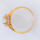 Anello “sole” in oro giallo 9K con apatite verde (1.19ct) e zaffiri bianchi