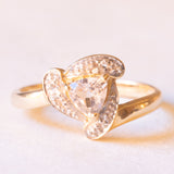 9K yellow and white gold ring with trillion-cut synthetic light pink sapphire (approx. 0.65ct) and white sapphires, 80s