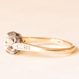 Antique 14K yellow gold and silver solitaire with central brilliant-cut diamond (approx. 0.55ct) and lateral rose-cut diamonds, 10s/20s