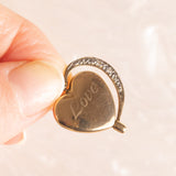 Vintage-Halskette mit Kette aus 9-karätigem Gelbgold und drehbarem herzförmigem Anhänger mit „Love“-Schriftzug aus 9-karätigem Gelbgold mit Diamanten