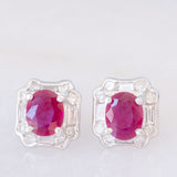 Orecchini a margherita vintage in platino con rubini (1.27ctw) e diamanti (0.50ctw), anni '80