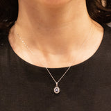 Ciondolo a margherita vintage in platino con zaffiro (0.64ct) e diamanti (0.23ctw)