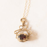 Vintage-Halskette mit drehbarem Anhänger aus 9-karätigem Gelbgold mit Quarz und Granat