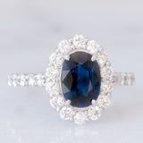 Anello a margherita vintage in platino con zaffiro (1.40ct) e diamanti di taglio brillante (0.94ctw), anni ‘80/‘90