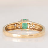 Vintage 9K yellow gold band ring with emerald (0.25ct approx.) and diamonds (0.12ctw approx.)