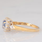 Anello a margherita vintage in oro giallo 9K con zaffiro (0.35ct ca.) e diamanti (0.14ctw ca.), anni ‘80
