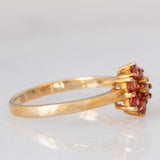 Anello a fiore in oro giallo 9K con zaffiri rossi (0.55ctw)
