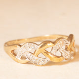 Anello vintage intrecciato in oro giallo e bianco 9K con diamanti (0.04ctw ca.), anni ‘70