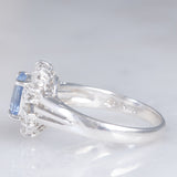 Anello a margherita vintage in platino con zaffiro (1.10ct) e diamanti (0.33ctw), anni ‘70