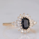 Bague marguerite vintage en or jaune et blanc 9 carats avec saphir (environ 1 ct) et diamants (environ 0.22 ct au total), 1989