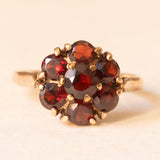 Vintage-Gänseblümchen-Ring aus 9-karätigem Gelbgold mit Granaten (ca. 1 Karat), 50er Jahre