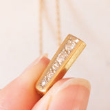 Collier vintage avec chaîne en or jaune 18 carats et pendentif en or jaune et blanc 18 carats avec diamants taille ancienne (environ 0.20 ct au total), années 60/70