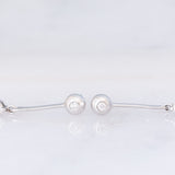 Orecchini pendenti vintage in oro bianco 14K con perle nere e diamanti (0.76ctw), anni ‘90