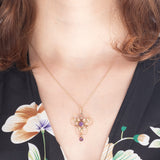 Pendente antico lavalier in oro giallo 9K con ametiste (0.60ctw ca.) e con decorazioni a foglie, anni ‘10/‘20