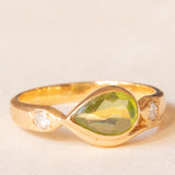 Vintage 18K yellow gold ring with peridot (0.75ct approx.) and diamonds (0.06ctw approx.), 70s/80s