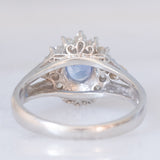 Anello margherita vintage in platino con zaffiro (0.75ct) e diamanti (0.31ctw), anni ‘80